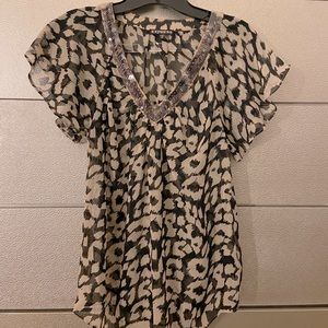Sparkle Ruffle Leopard Express Top